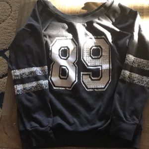 Wet seal over the shoulder sweater